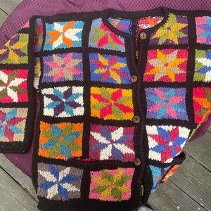 Hand knit cardigan with colorful star quilt pattern and pockets women’s sz XL